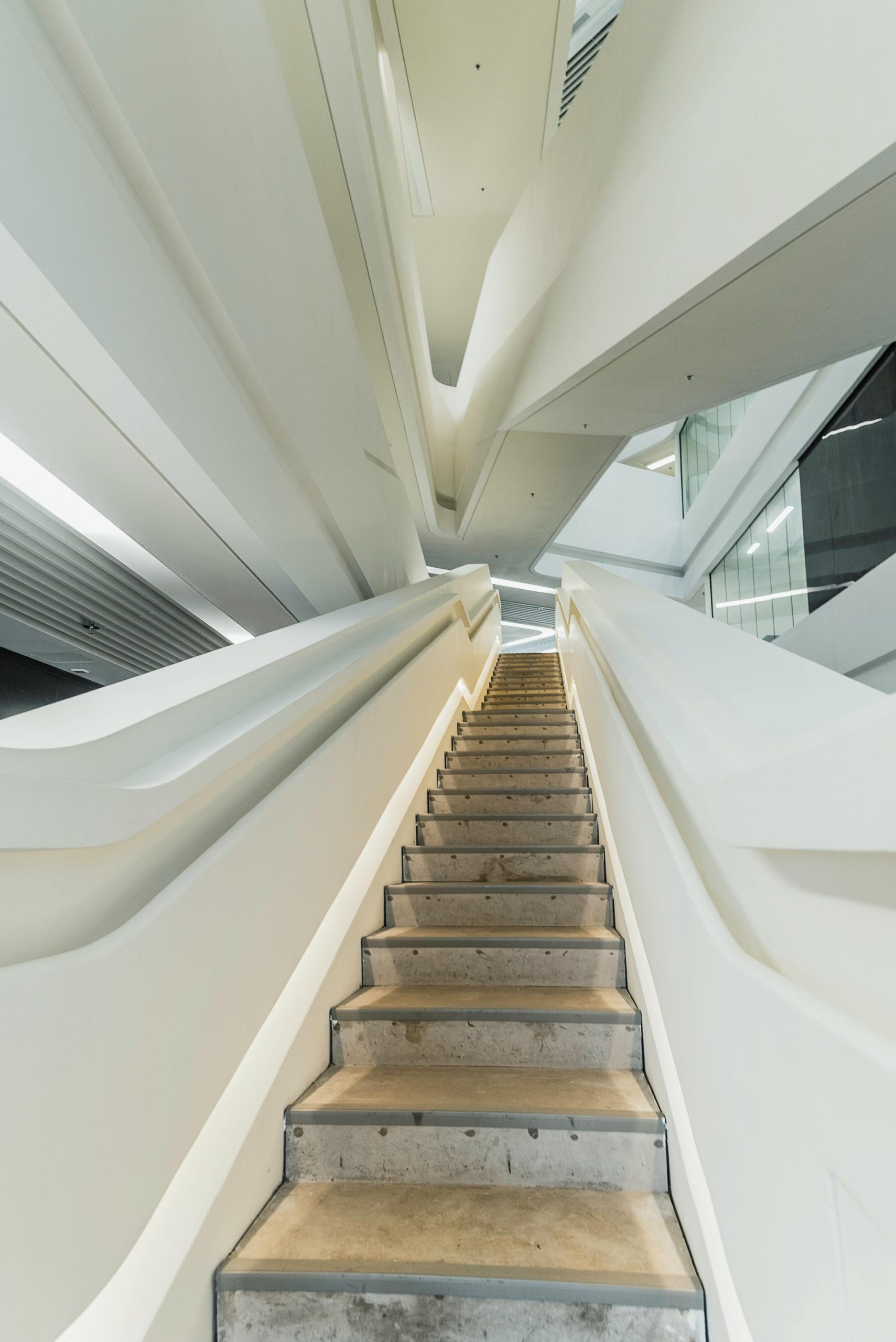 A contemporary staircase with sleek design and modern architecture indoors.